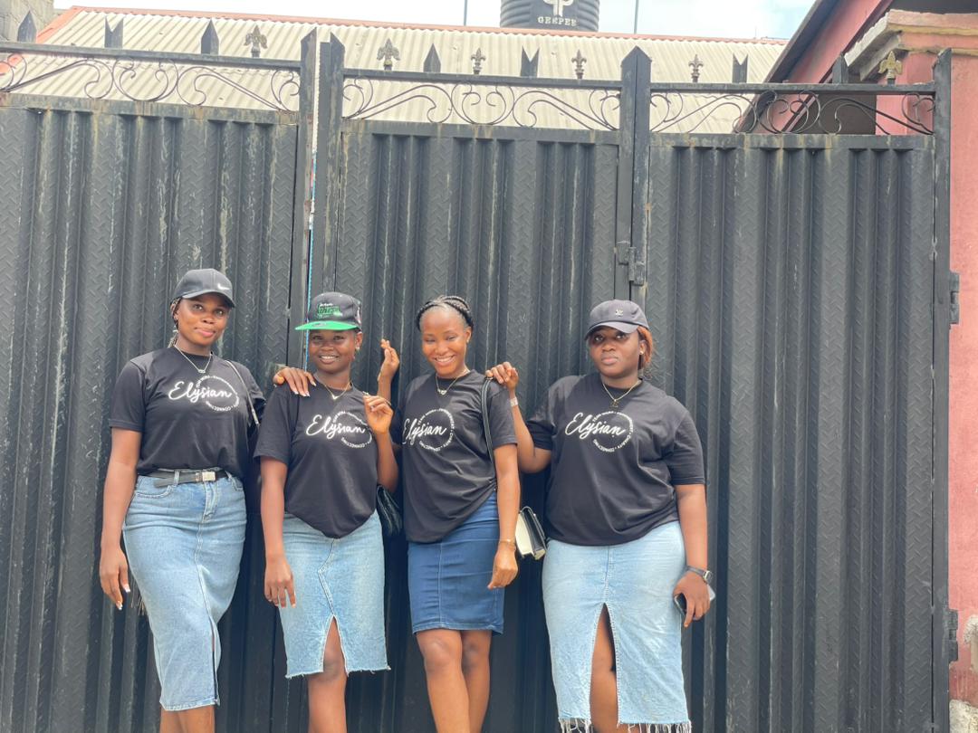 Elysian team members in branded t-shirts